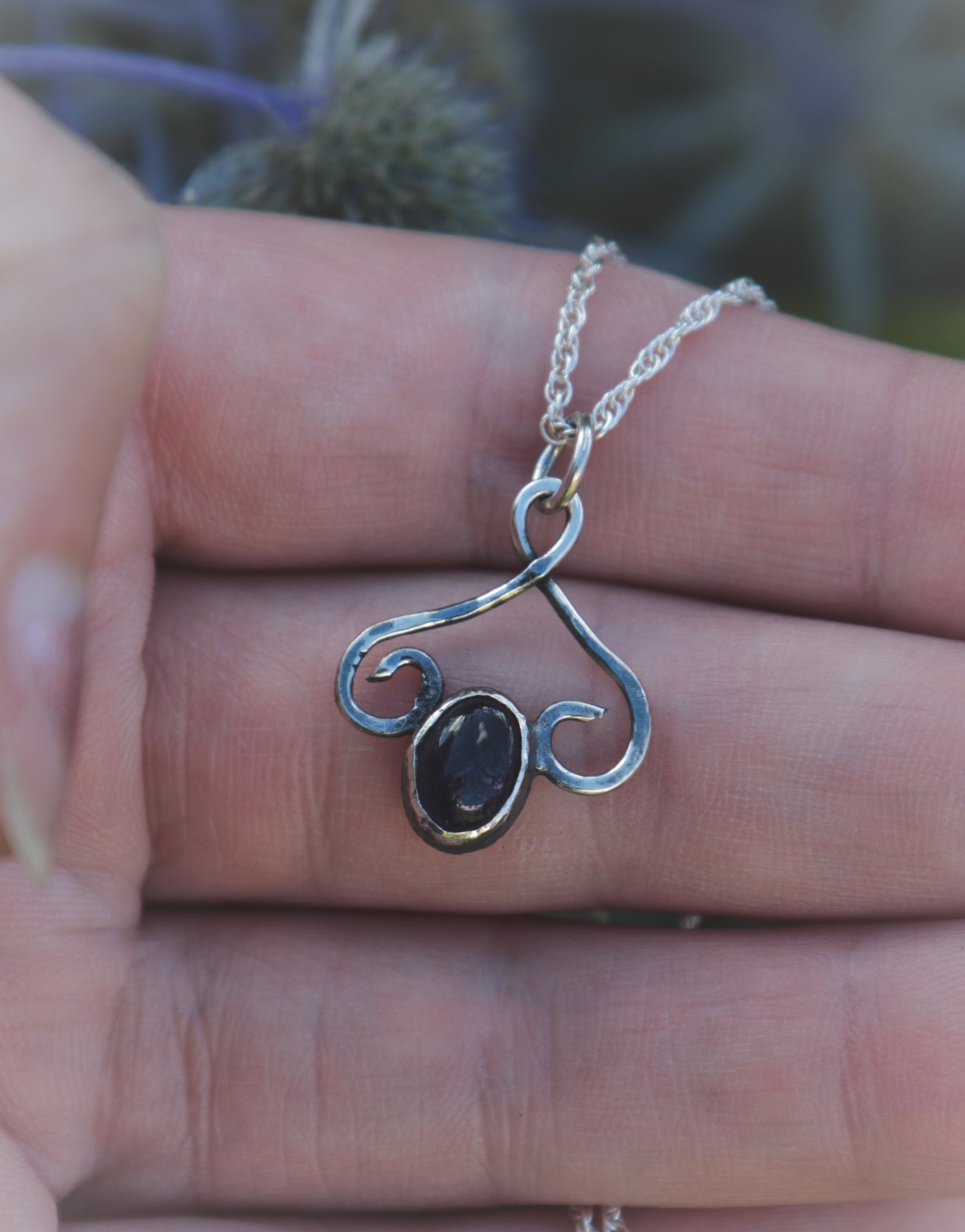 Dark Amethyst flourish necklace.