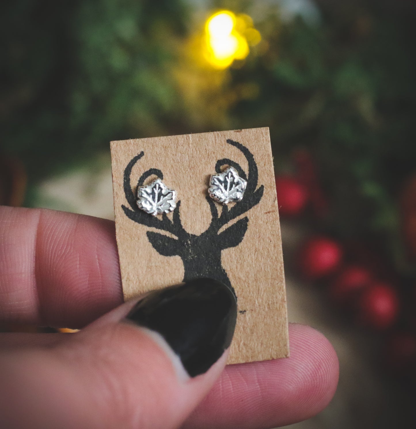 Maple leaf studs.