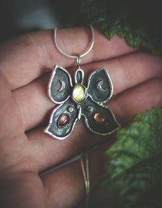 Butterfly necklace with Peridot and Tourmaline.