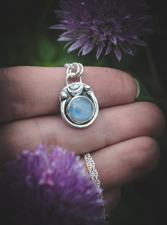 Moonstone moon necklace.