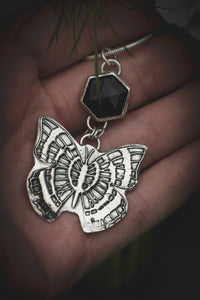 Black Onyx necklace with silver butterfly.