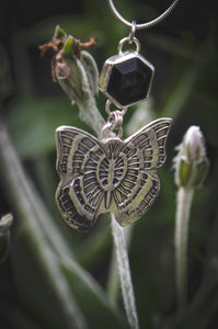 Black Onyx necklace with silver butterfly.