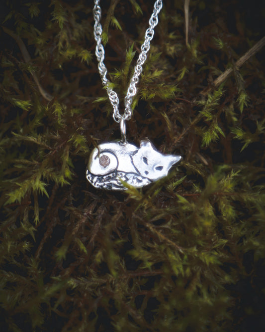 A cute sleeping fox, with Cubic Zirconia