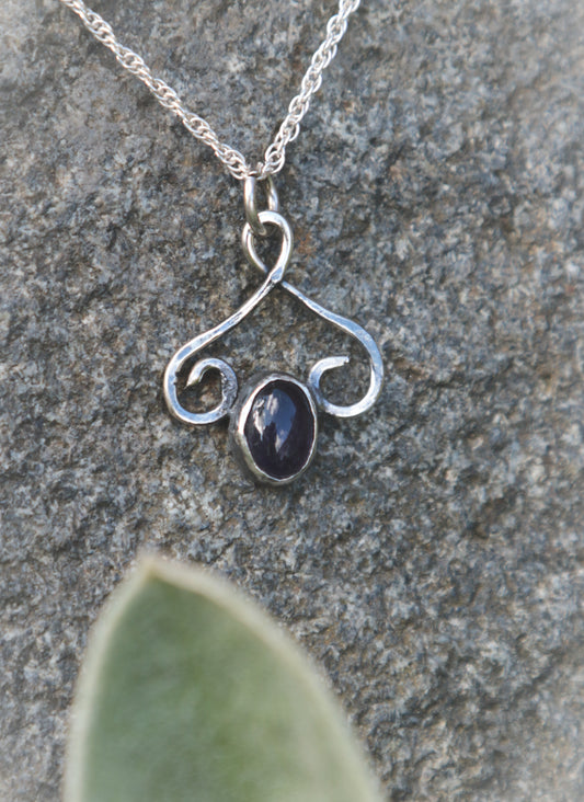 Dark Amethyst flourish necklace.