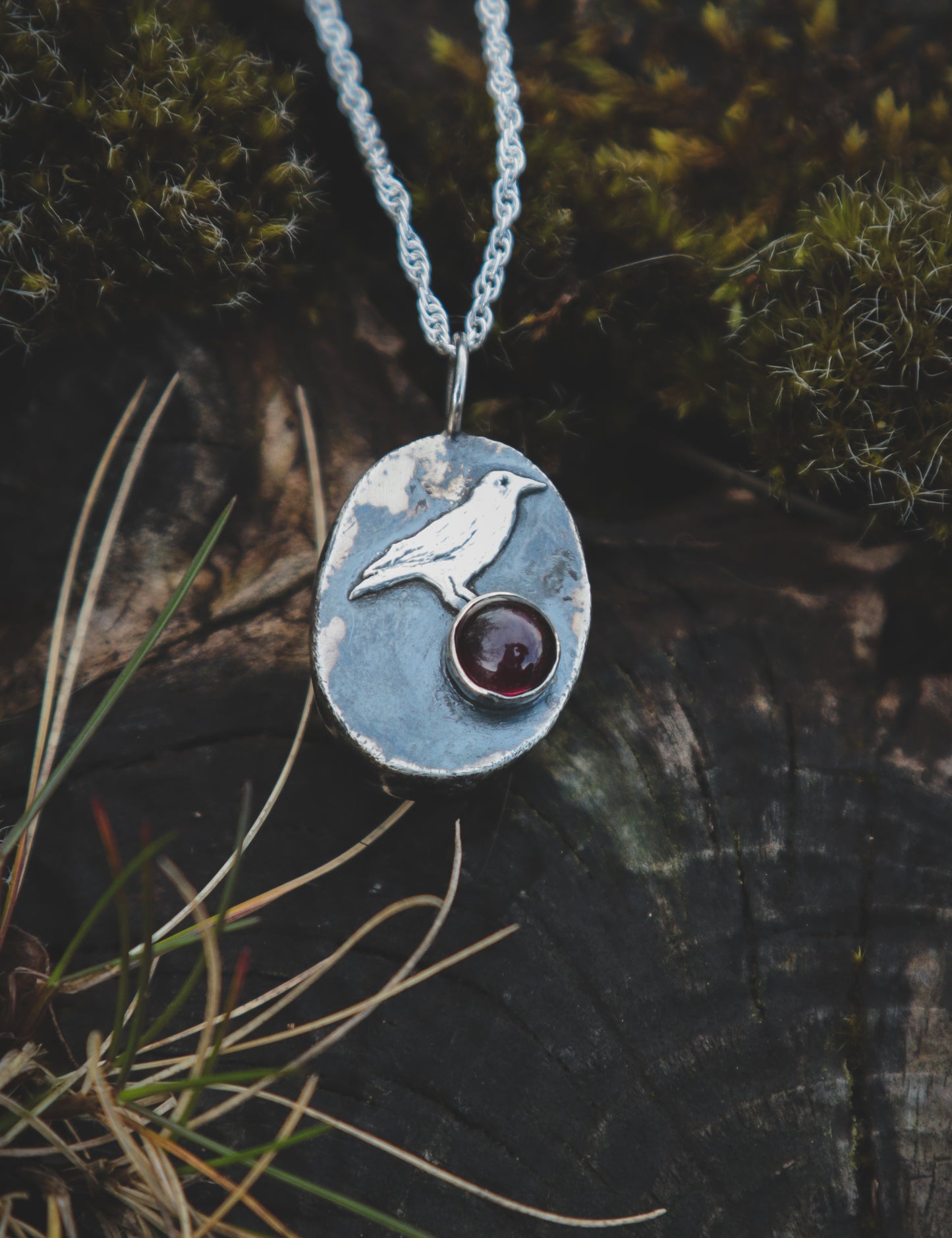 Labradorite necklace with a Crow and Garnet.