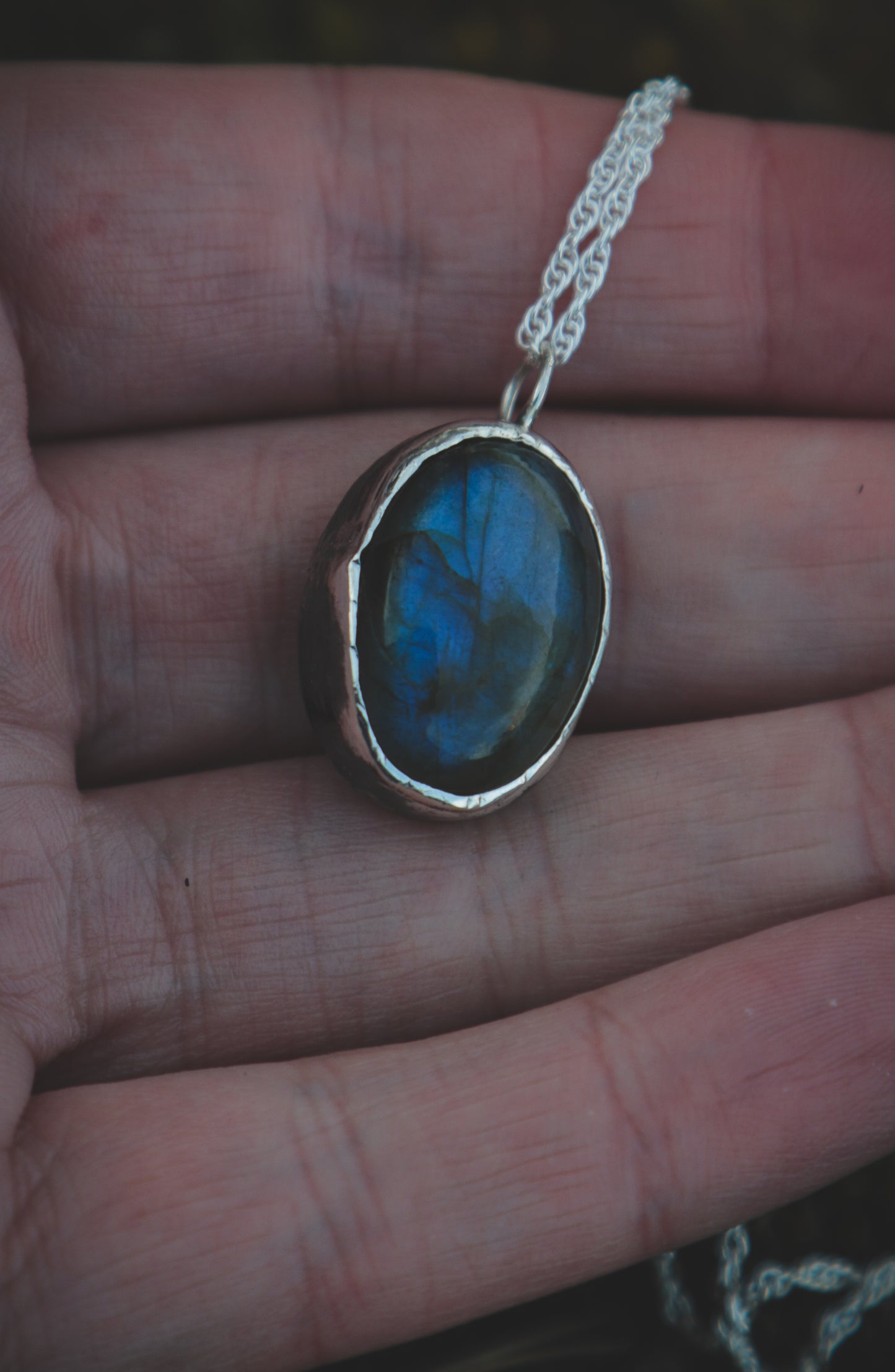 Labradorite necklace with a Crow and Garnet.