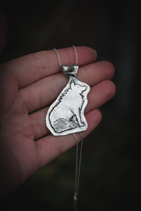Wolf pendant with Garnet