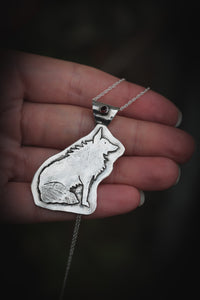 Wolf pendant with Garnet