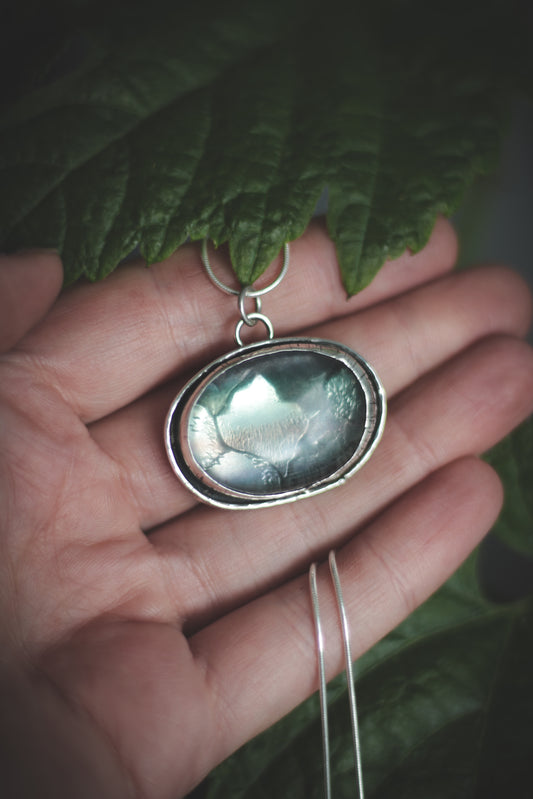 Fluorite necklace. Mountains within.